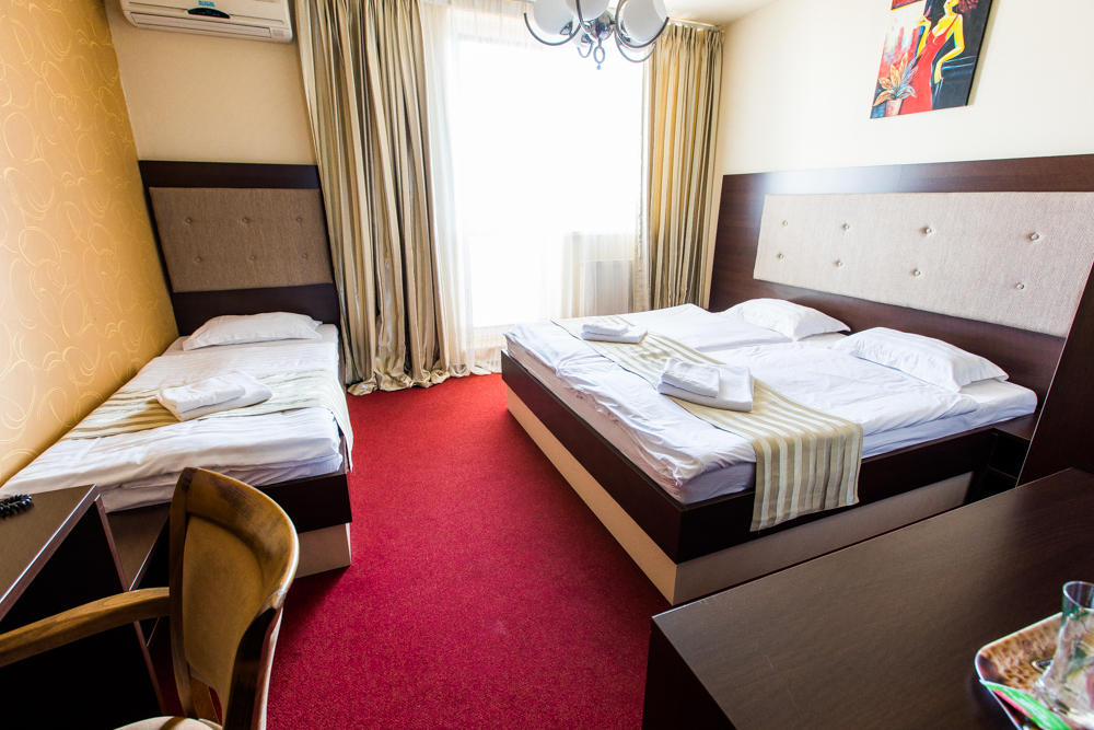 Trojlôžková izba Deluxe s balkónom